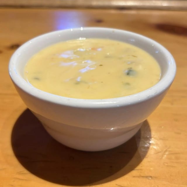 Side 6oz Queso.